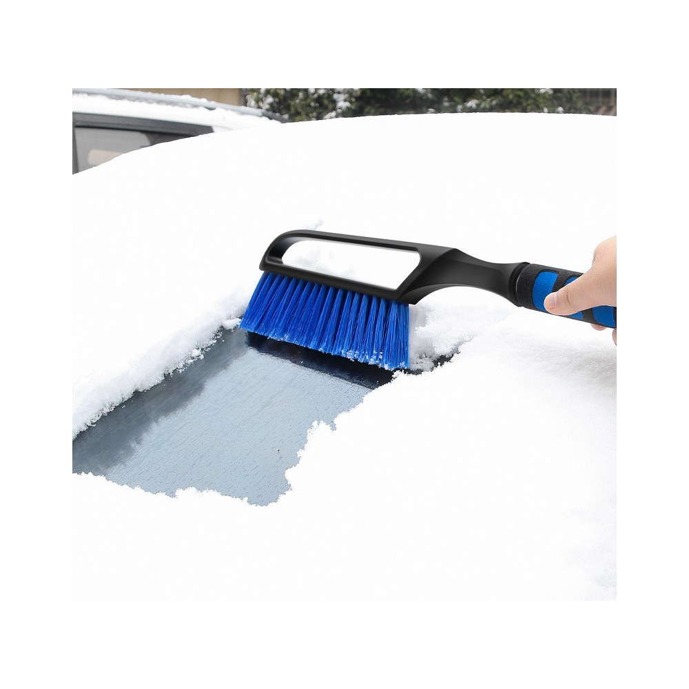 Snow brush sweeping snow off car windshield without scratching paint